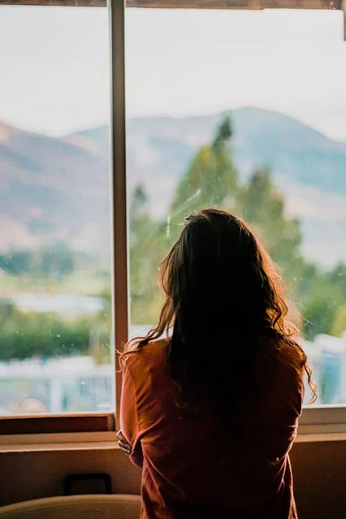 a person staring through the window