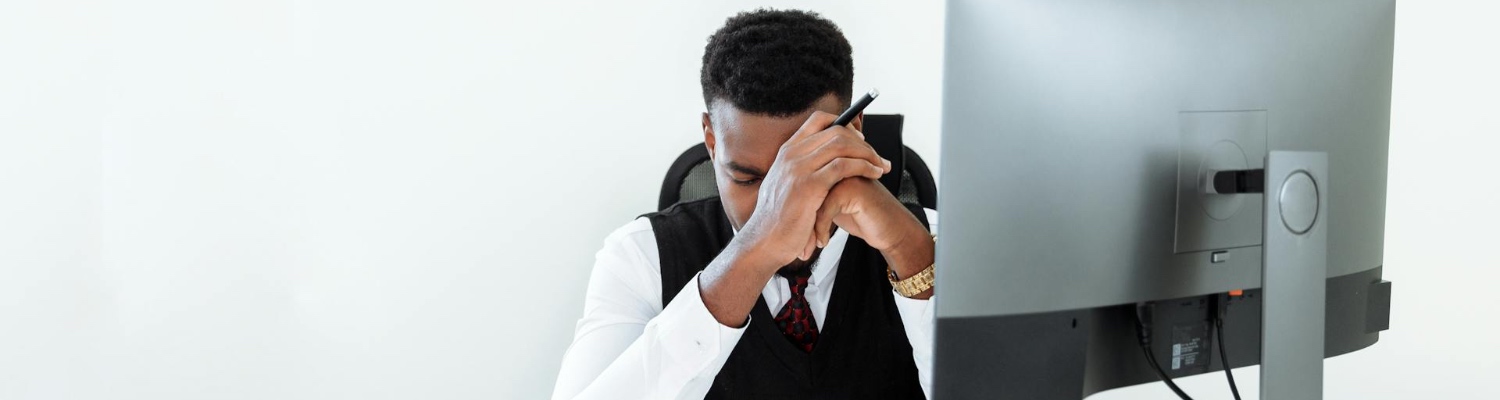 A person having trouble with poor mental health in the workplace